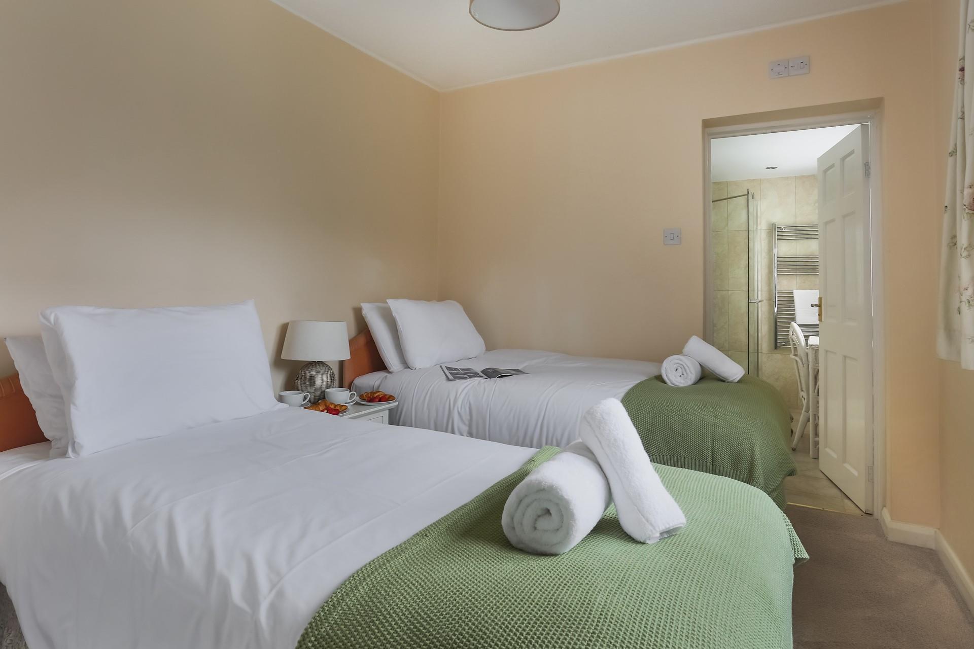 The twin beds allow for flexible sleeping arrangements.