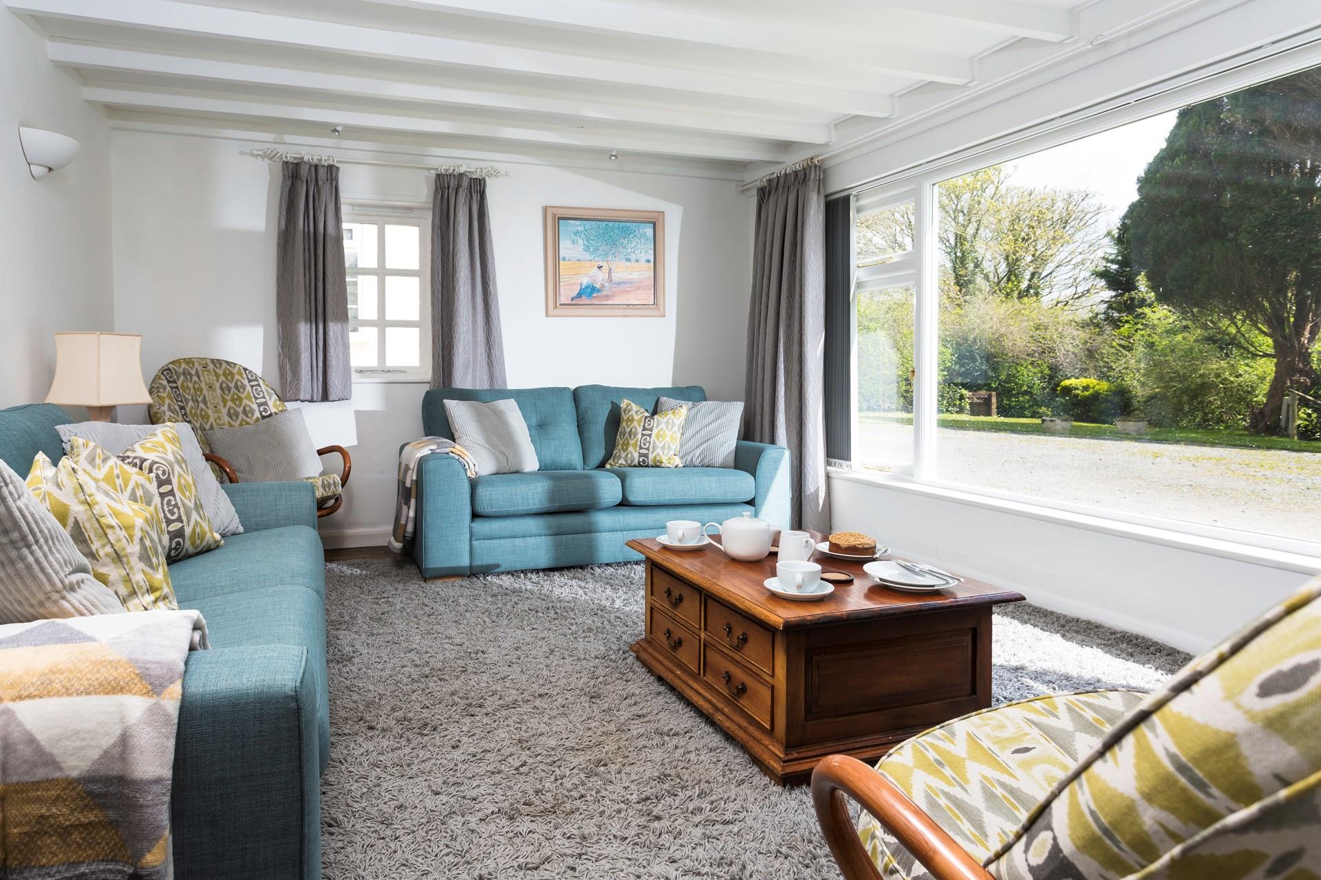 The large sitting room is perfect for spending quality time together as a family.