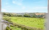 Countryside views stretch over the fields from this cute cottage. - Thumbnail Image