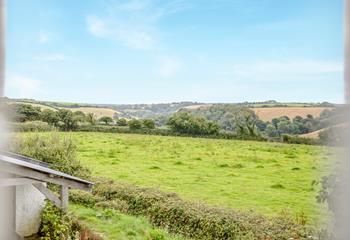 Countryside views stretch over the fields from this cute cottage.