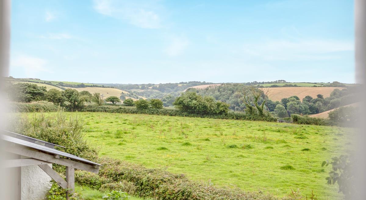 Countryside views stretch over the fields from this cute cottage.