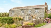 Rose Cottage is a charming cottage in the quaint hamlet of St Ewe.