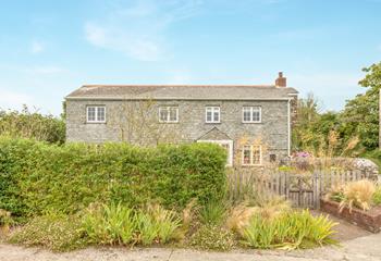 Open the gate to Rose Cottage and let your troubles drift away.