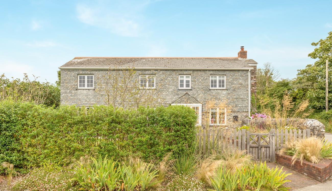 Open the gate to Rose Cottage and let your troubles drift away.