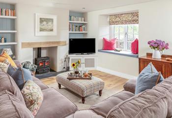 The cosy sitting room is the ideal base to unwind in the evenings.