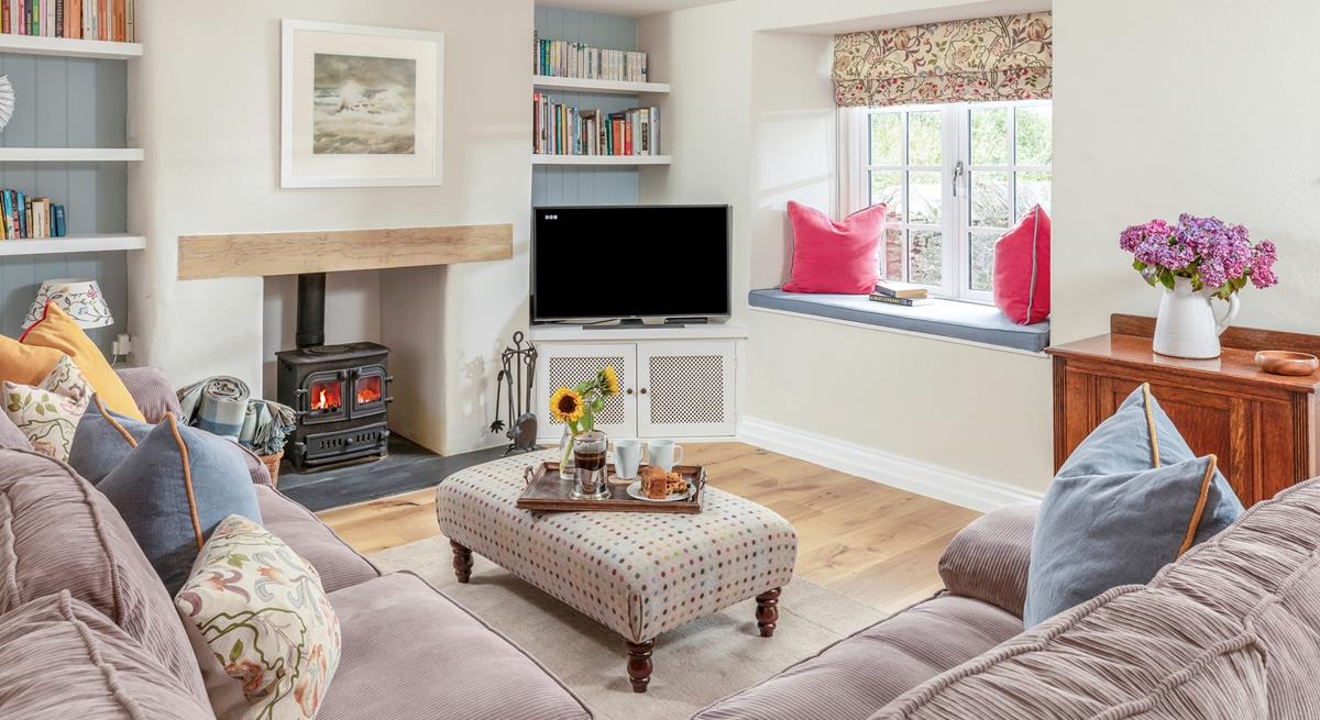 The cosy sitting room is the ideal base to unwind in the evenings.