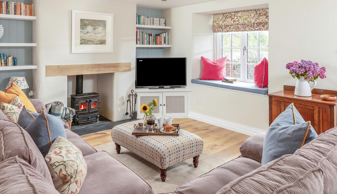 The cosy sitting room is the ideal base to unwind in the evenings.