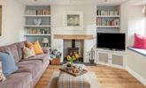 Light the woodburner and snuggle up on the sofa. - Thumbnail Image