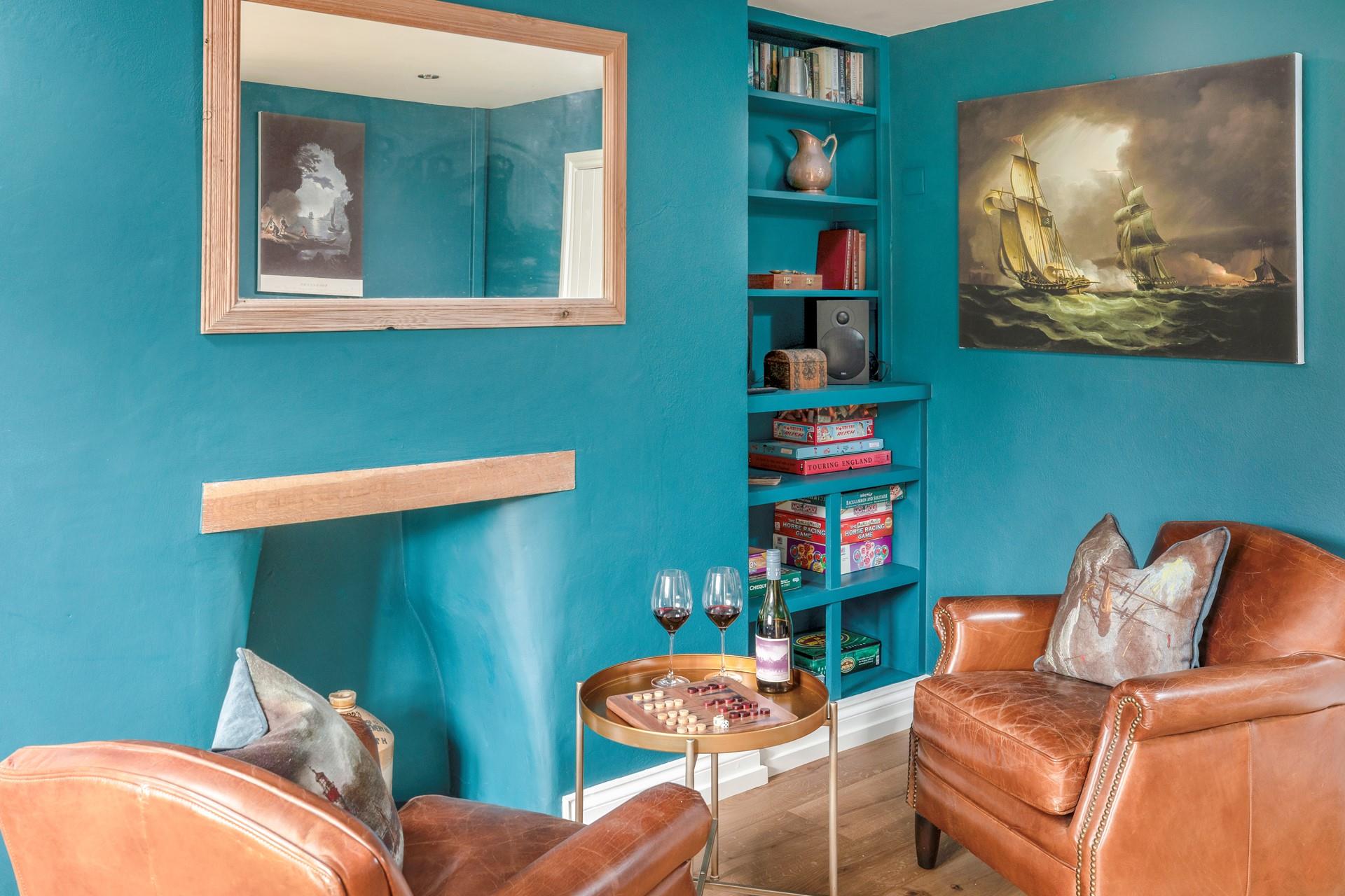 The snug area has additional seating and is a quiet space to enjoy a drink and some board games.