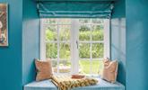 The window seat is the ideal spot for watching wildlife in the garden. - Thumbnail Image