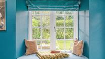 The window seat is the ideal spot for watching wildlife in the garden.