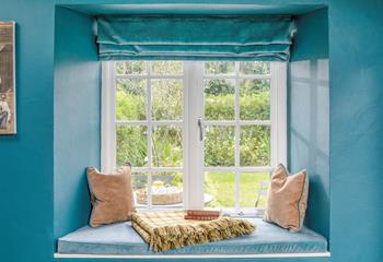 The window seat is the ideal spot for watching wildlife in the garden.