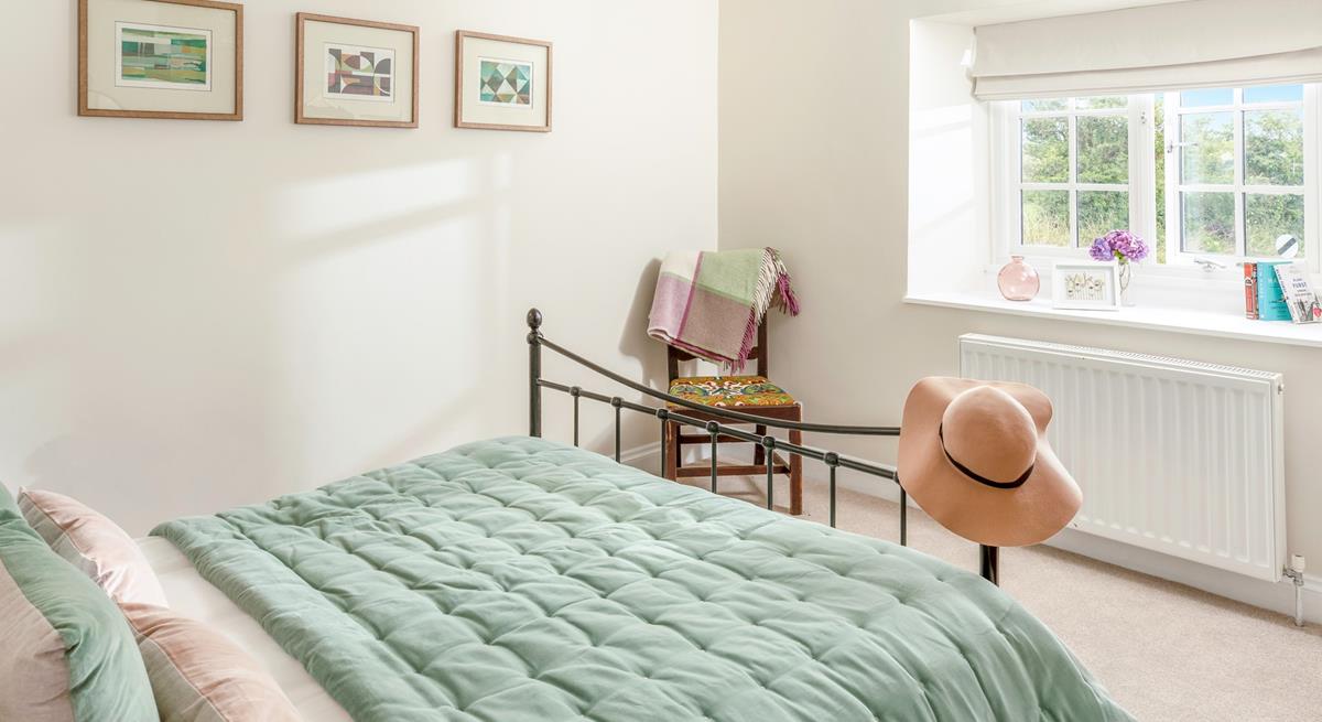 Climb out of bed to make a cuppa to sip in the peaceful garden.