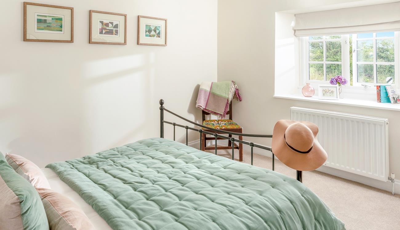 Climb out of bed to make a cuppa to sip in the peaceful garden.