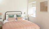 Bedroom 2 has a delightful doube bed to relax and unwind. - Thumbnail Image