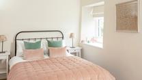 Bedroom 2 has a delightful doube bed to relax and unwind.