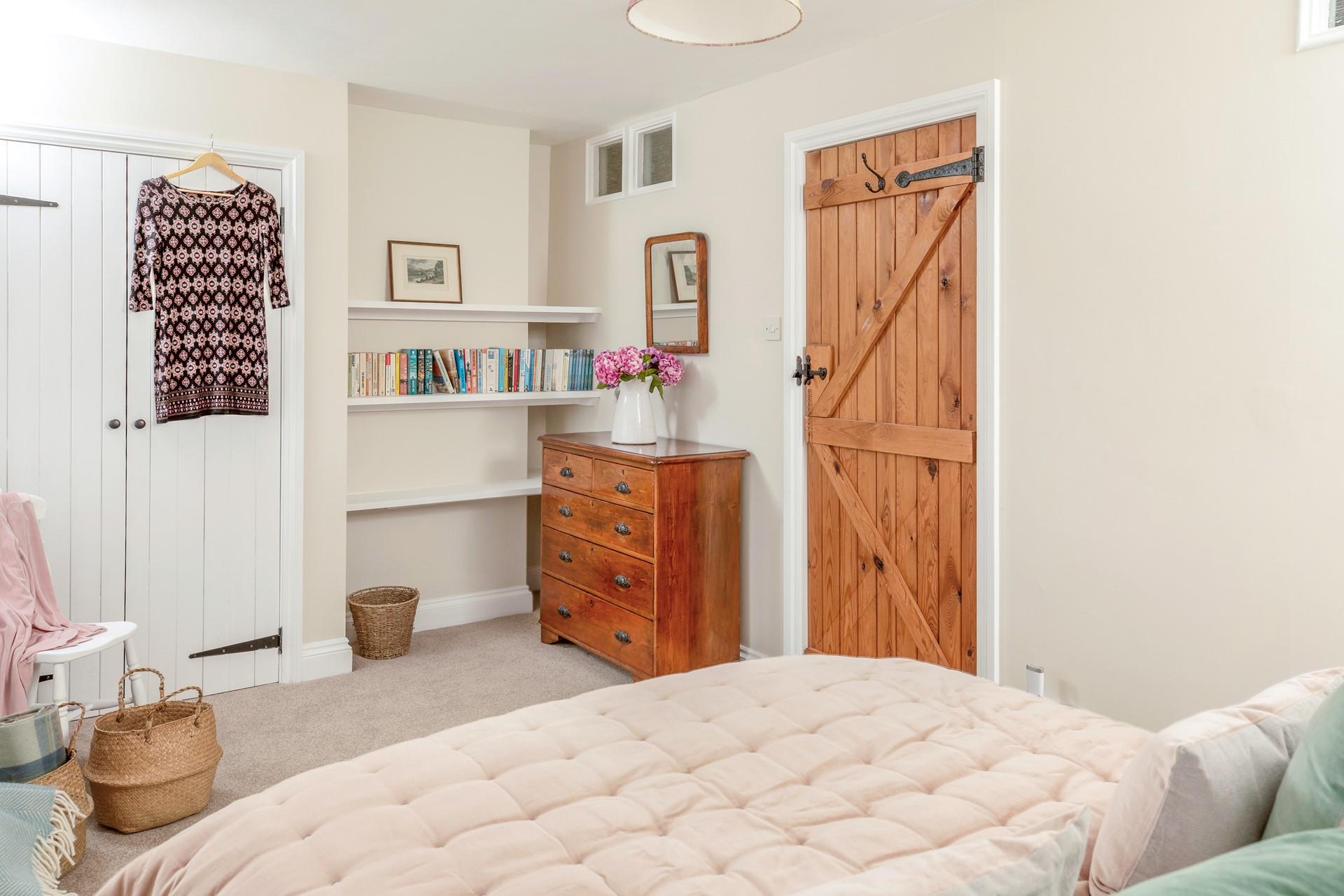 The bedrooms are tastefully decorated to retain the cottage charm.