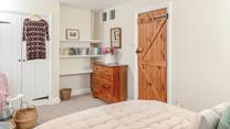 The bedrooms are tastefully decorated to retain the cottage charm.