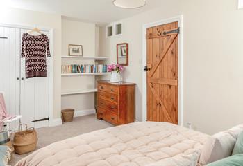 The bedrooms are tastefully decorated to retain the cottage charm.