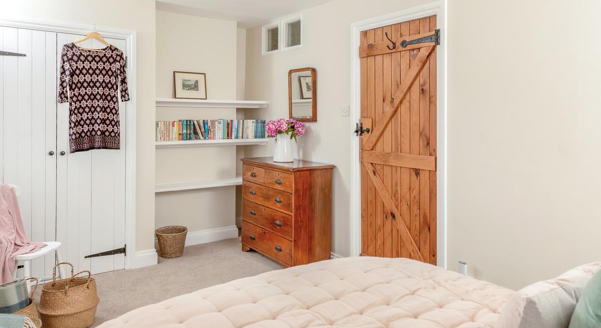 The bedrooms are tastefully decorated to retain the cottage charm.