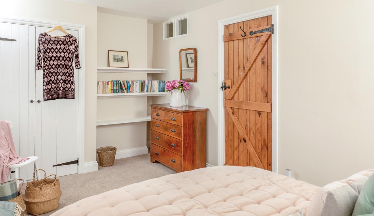 The bedrooms are tastefully decorated to retain the cottage charm.