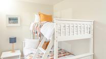 The bunk beds are an additional space ideal for children or adults.