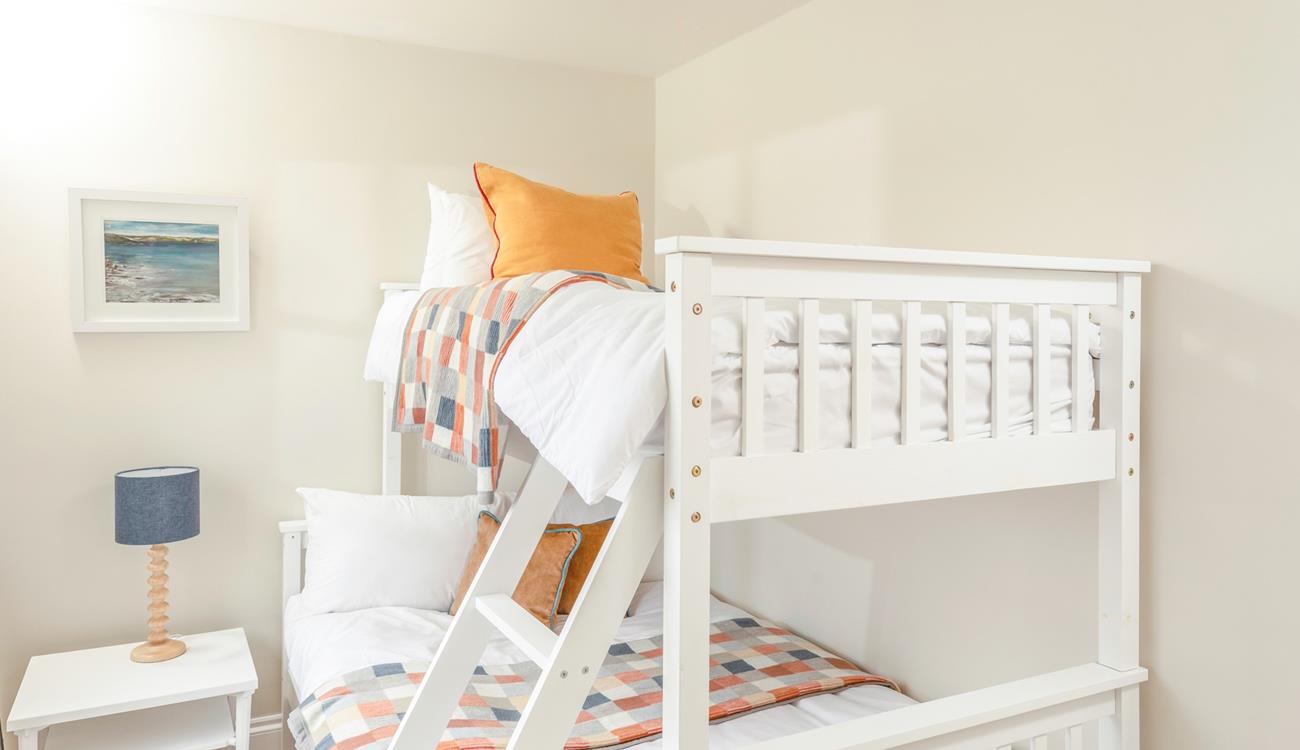 The bunk beds are an additional space ideal for children or adults.