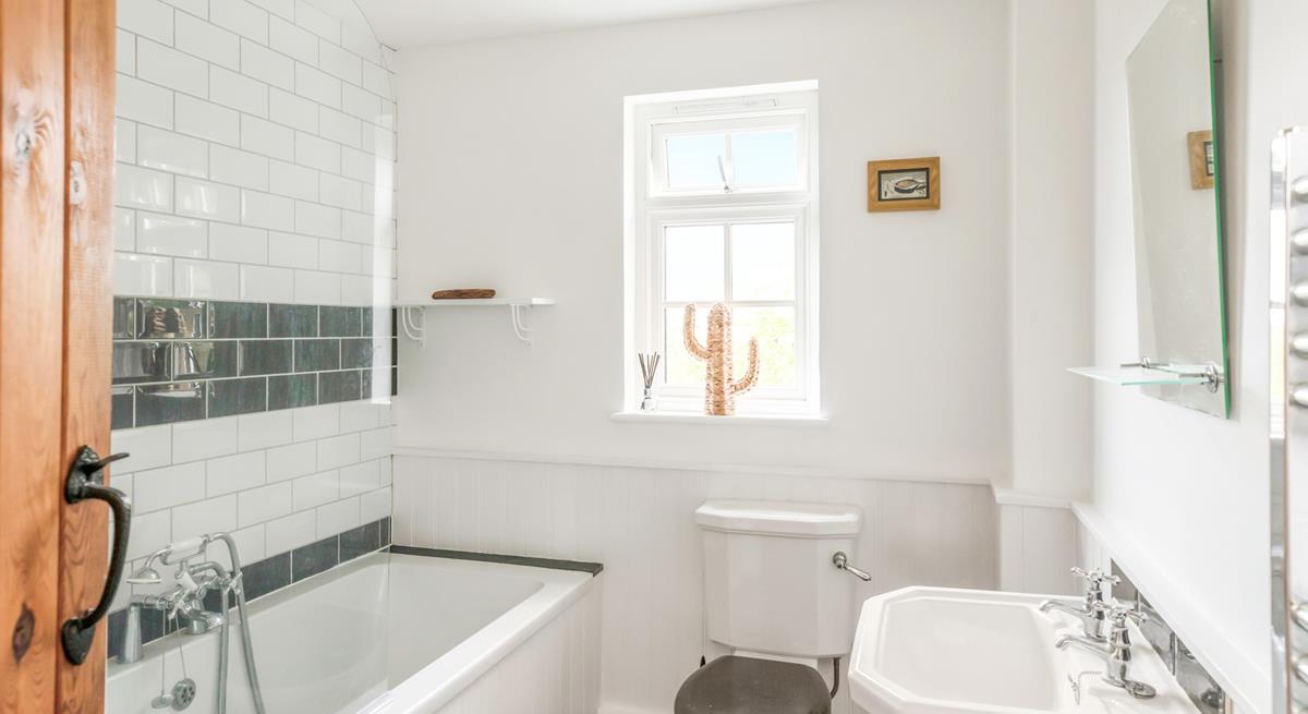 Get ready each morning in the modern bathroom.