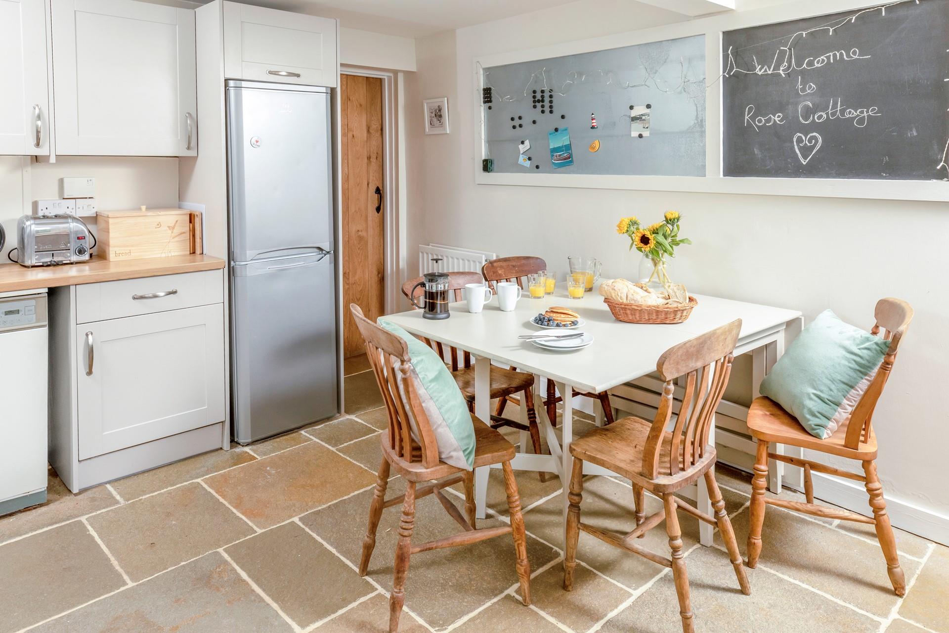 Tuck into a hearty breakfast around the dining table.