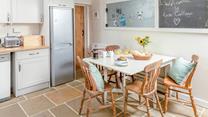 Tuck into a hearty breakfast around the dining table.