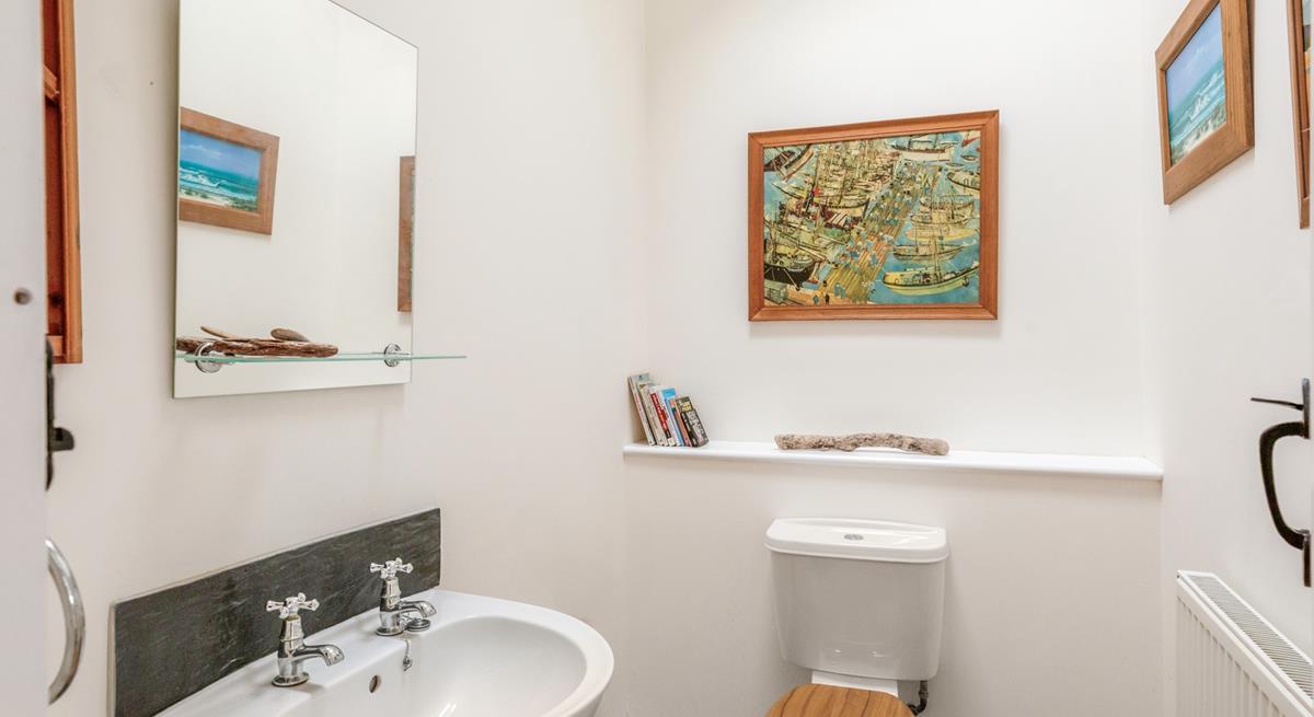 There is a downstairs WC and basin.