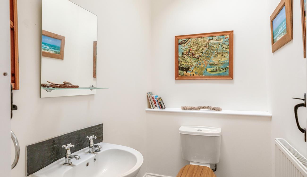 There is a downstairs WC and basin.