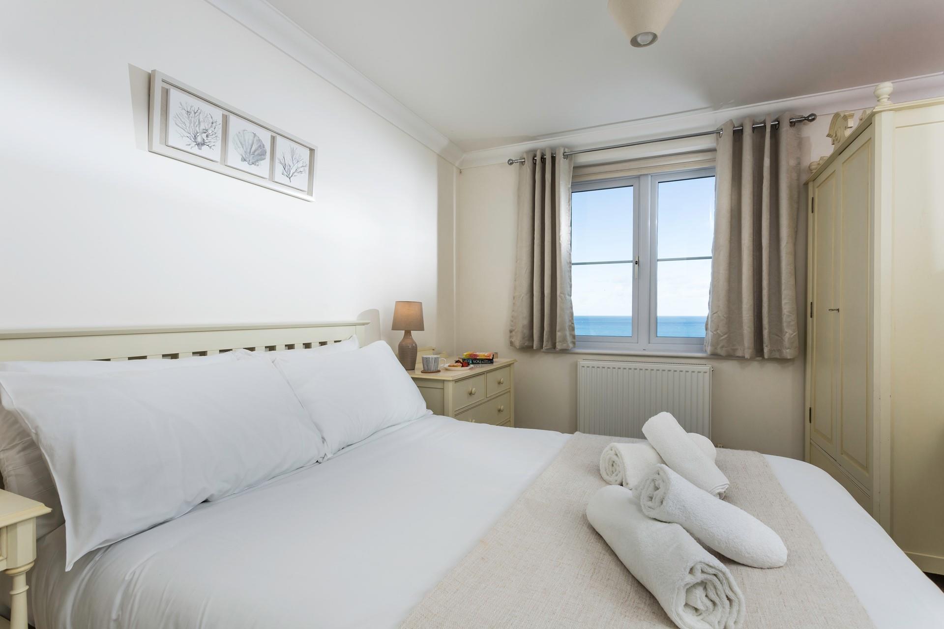 Draw open the curtains and check the day's weather.