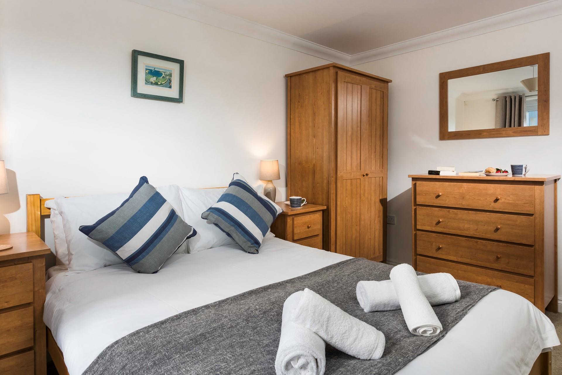 Sip a morning coffee in bed whilst discussing the day's plans.