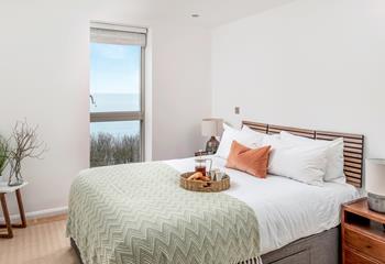 Wake up to sea views in the bedroom.