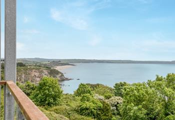 Soak up sun and sea views on the balcony.