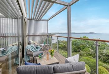 The balcony offers stunning views and a place to relax and unwind.