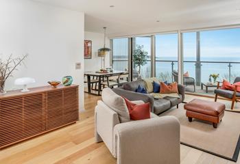 The open plan living space is filled with light, taking advantage of the views.