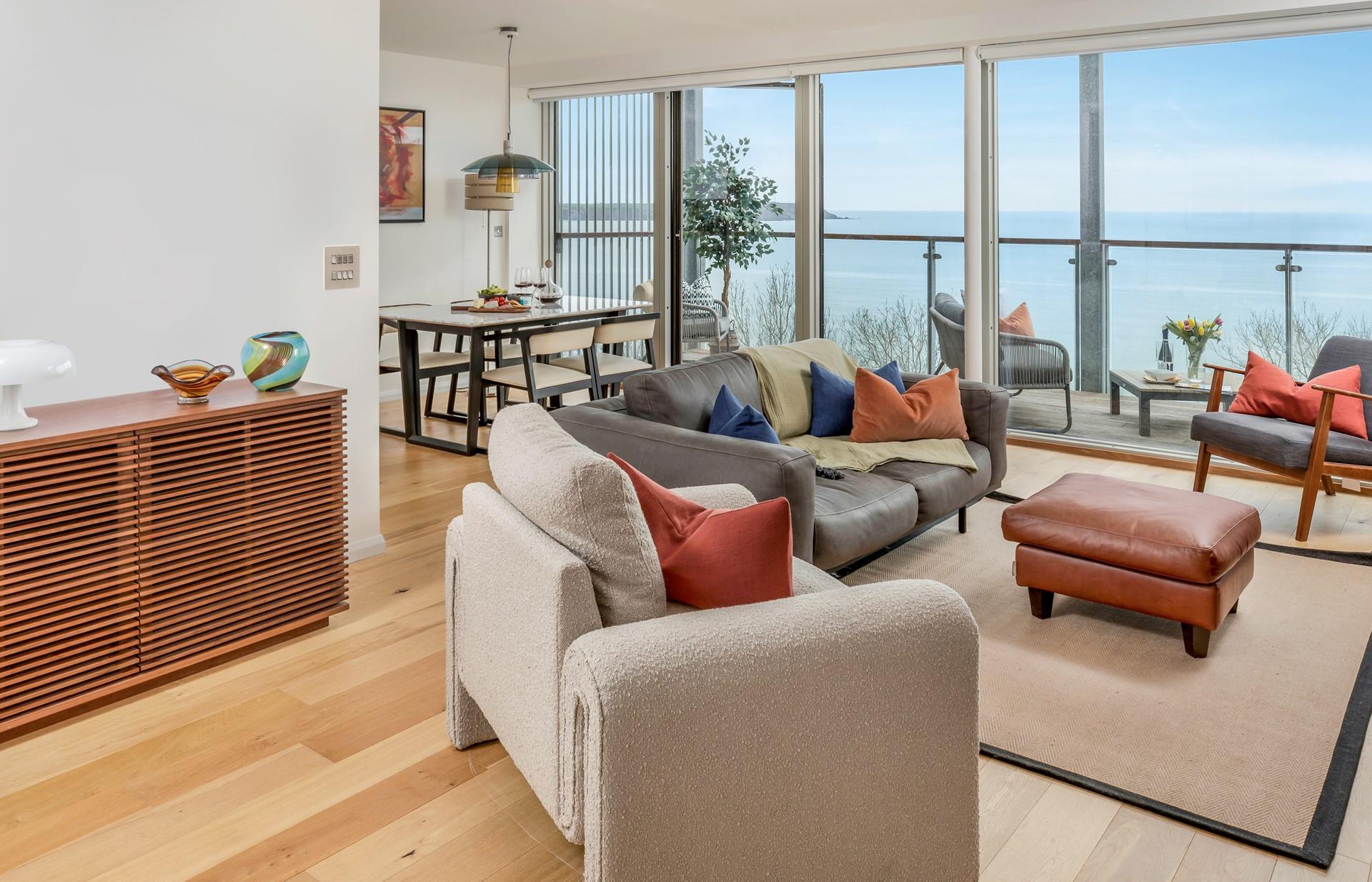 The open plan living space is filled with light, taking advantage of the views.