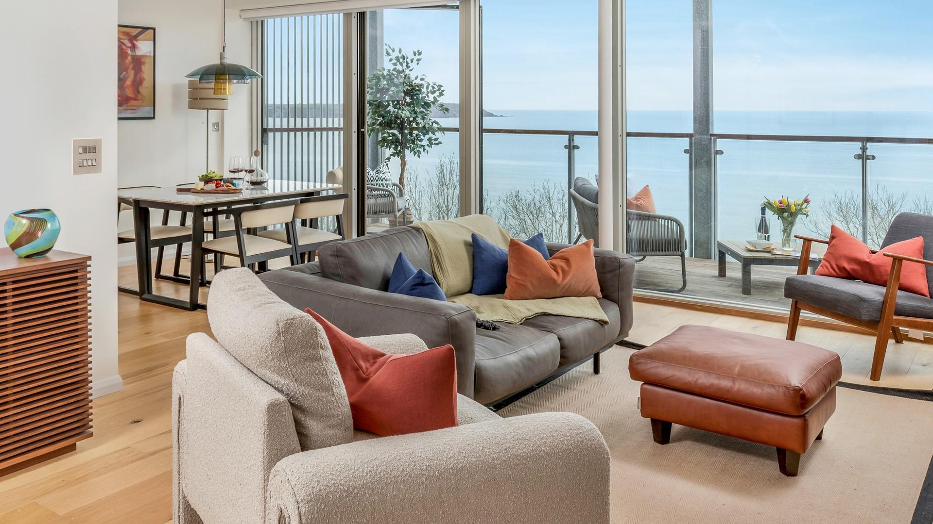 The open plan living space is filled with light, taking advantage of the views.