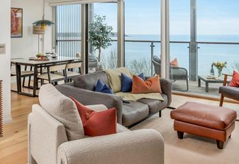 The open plan living space is filled with light, taking advantage of the views.