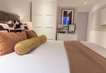 The bedrooms are stylishly decorated.