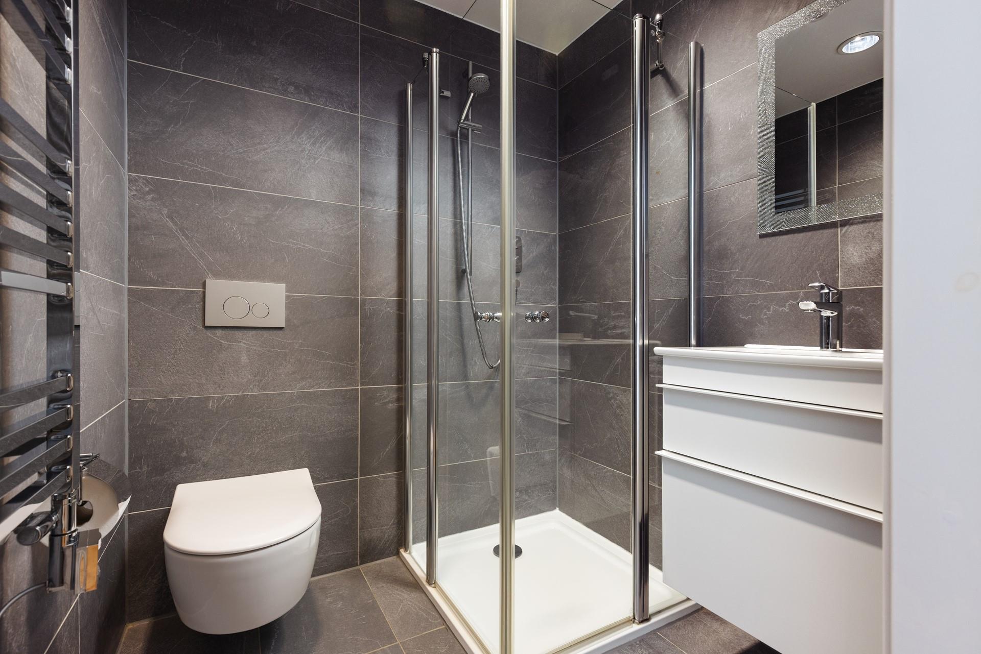Get ready for the day in the en suite shower room.