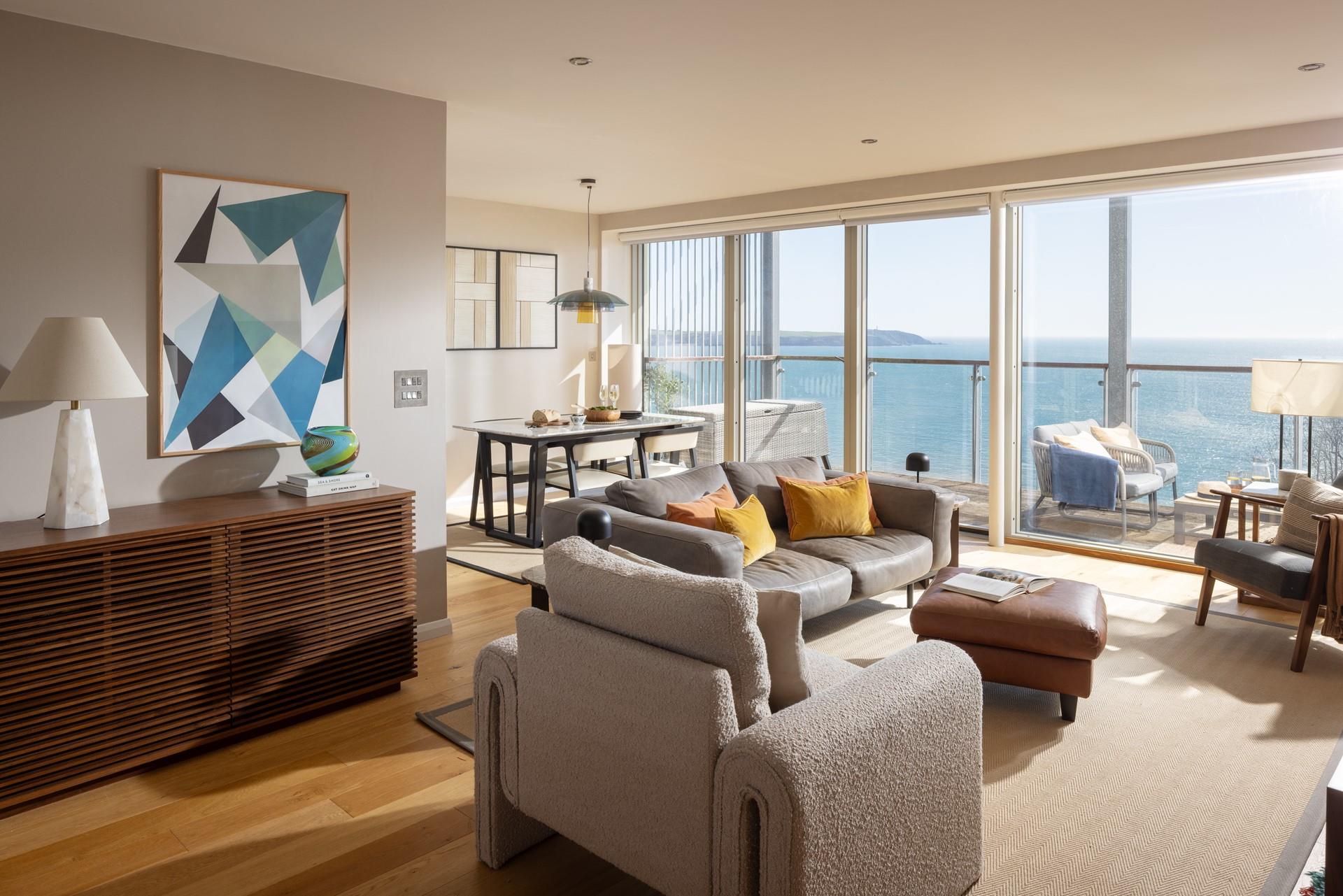 The open plan living space is filled with light, taking advantage of the views.