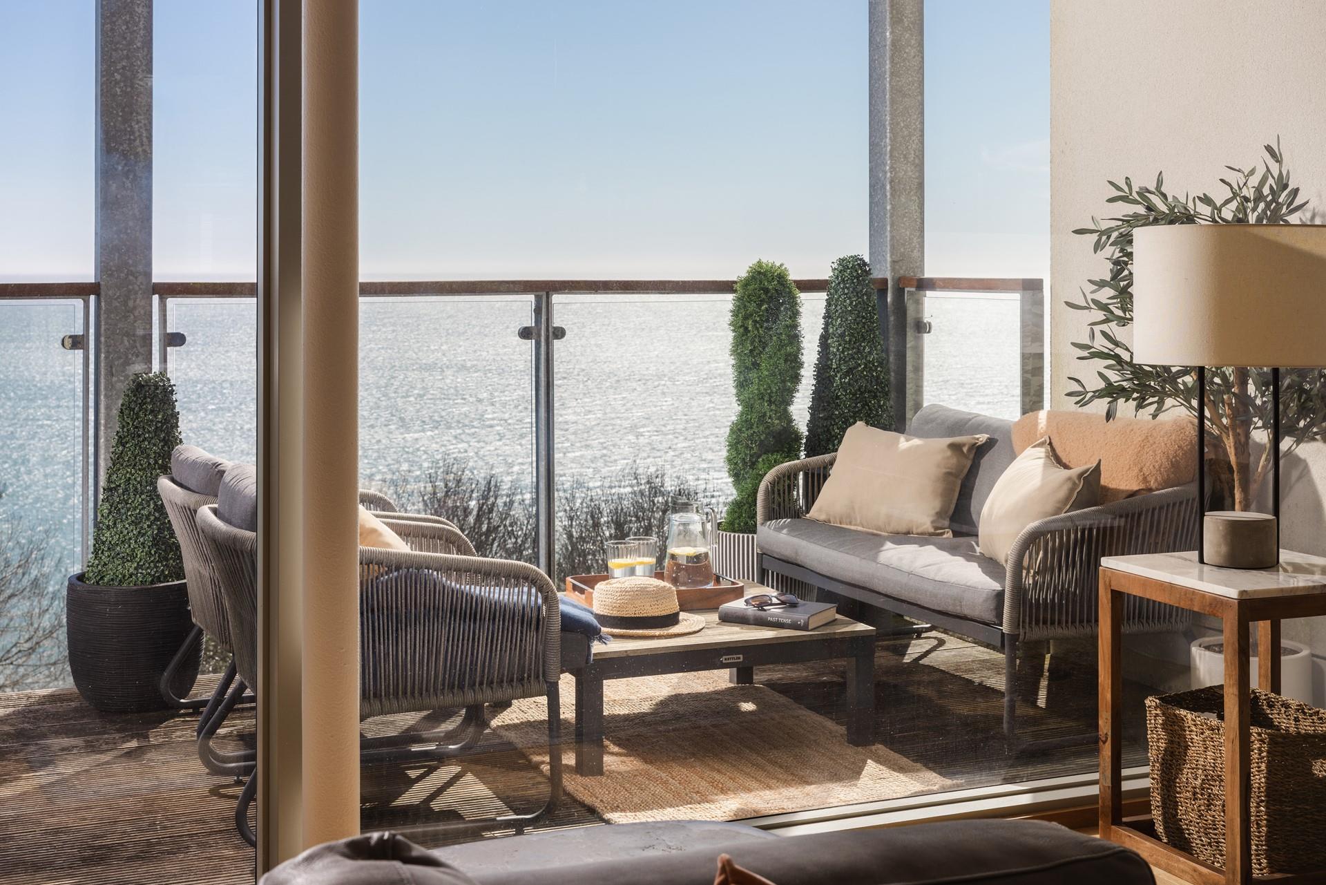 Relax and unwind on the balcony with a view!