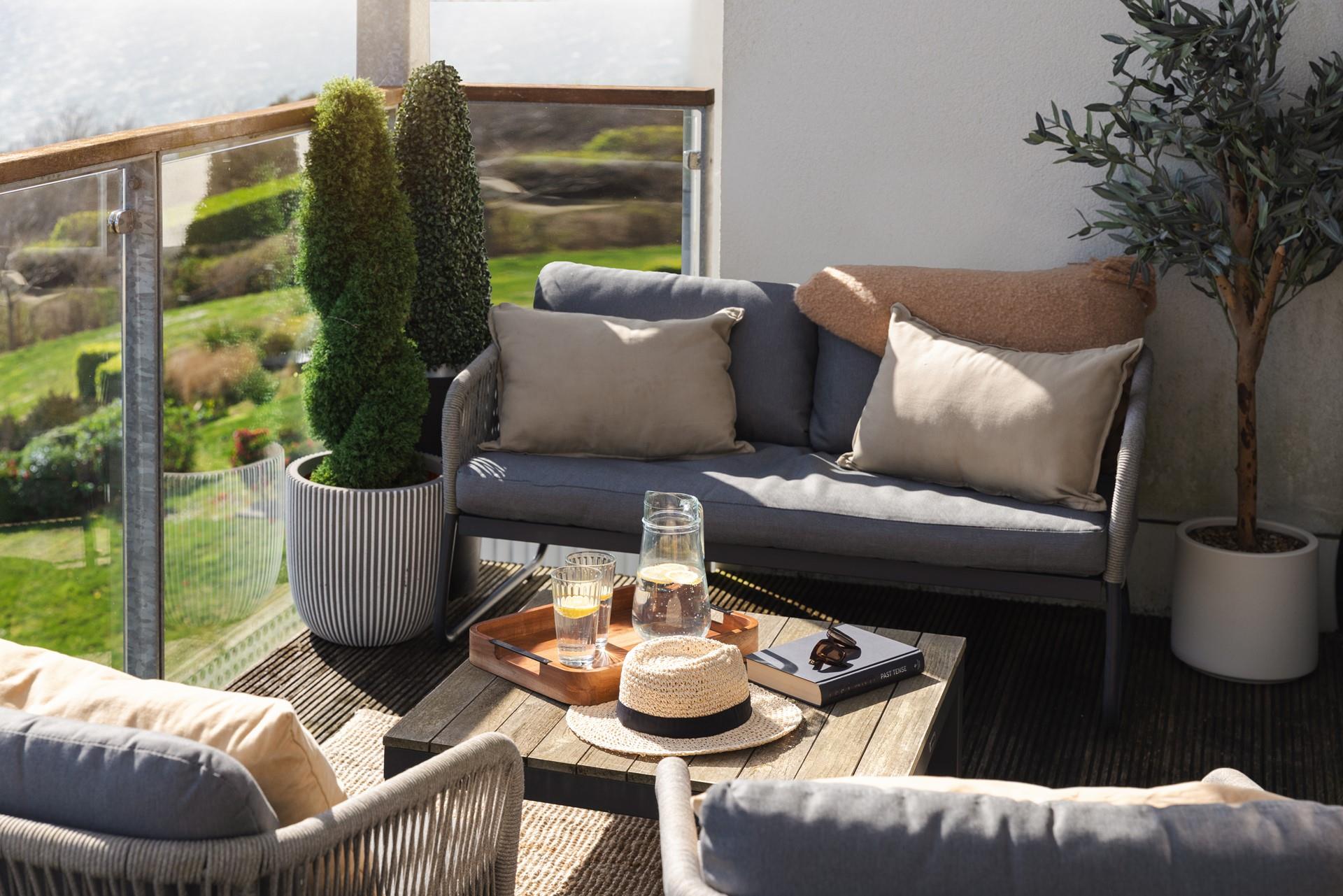 The balcony is the ideal spot to dine al fresco.