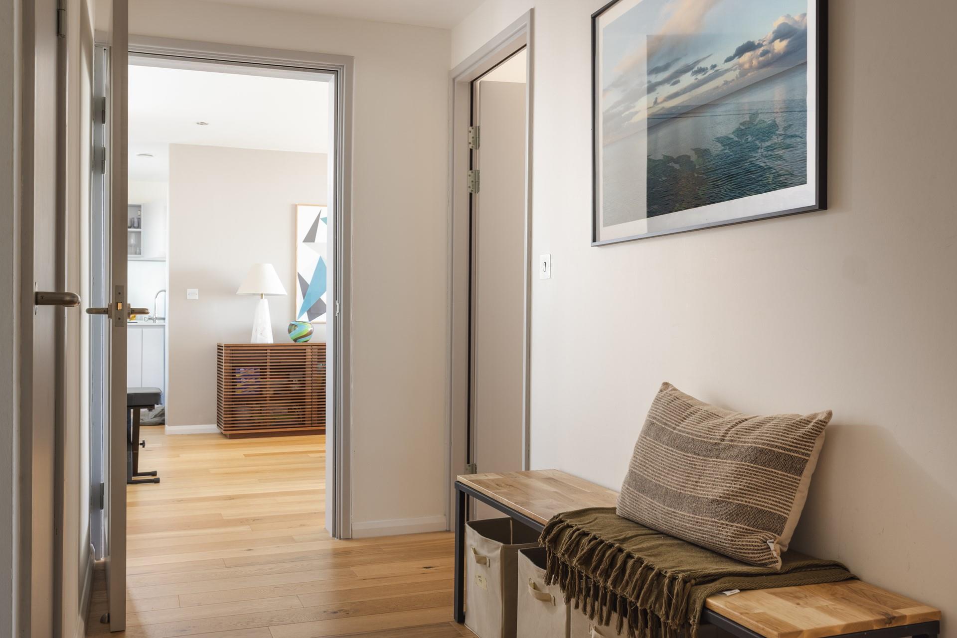 Modern furnishings feature throughout the apartment.