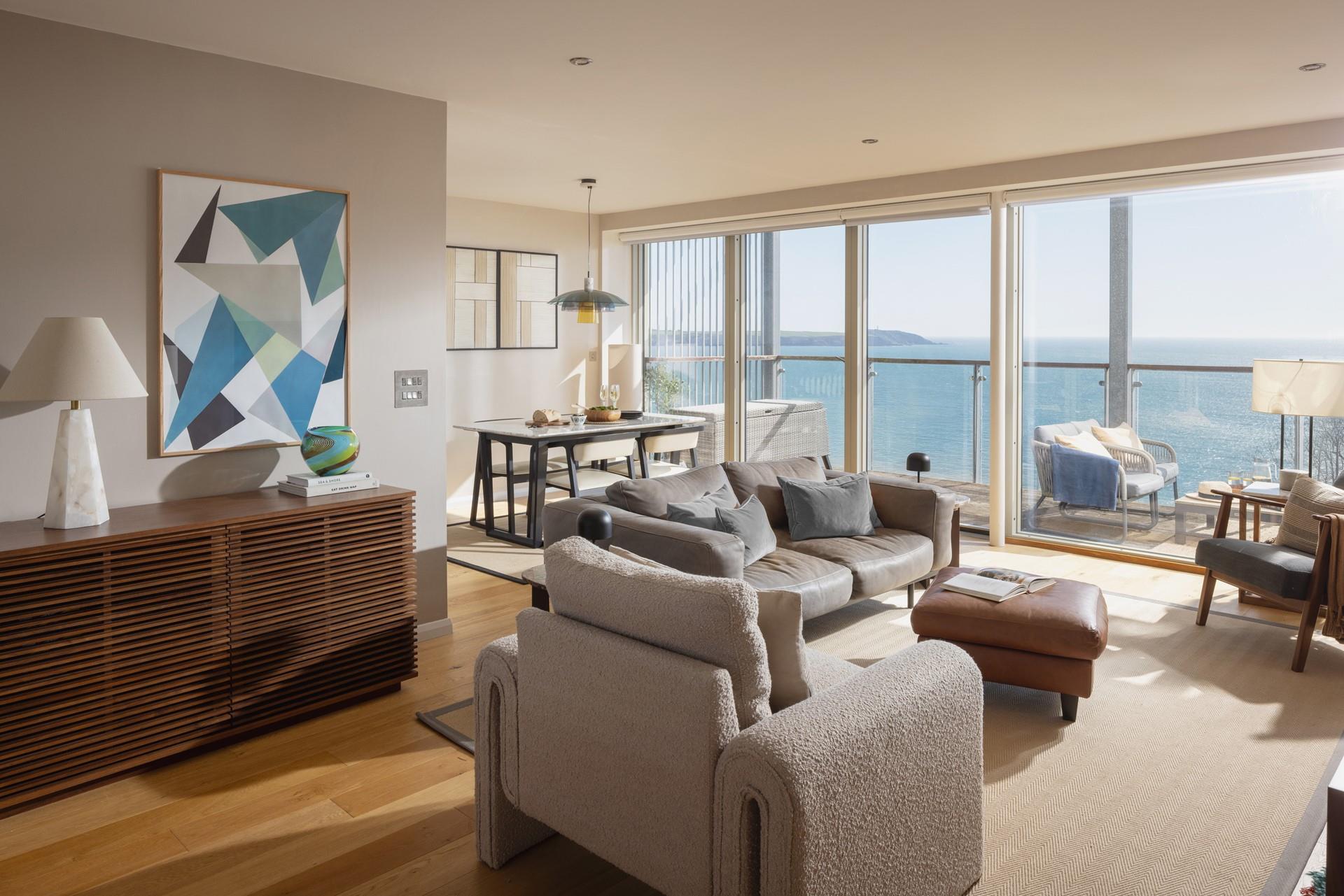 The open plan living space is filled with light, taking advantage of the views.