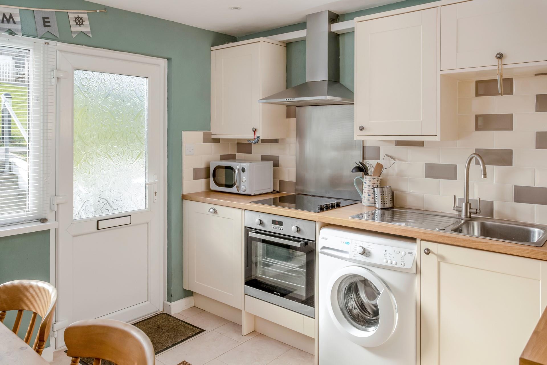 Cook up a storm in the well equipped kitchen.