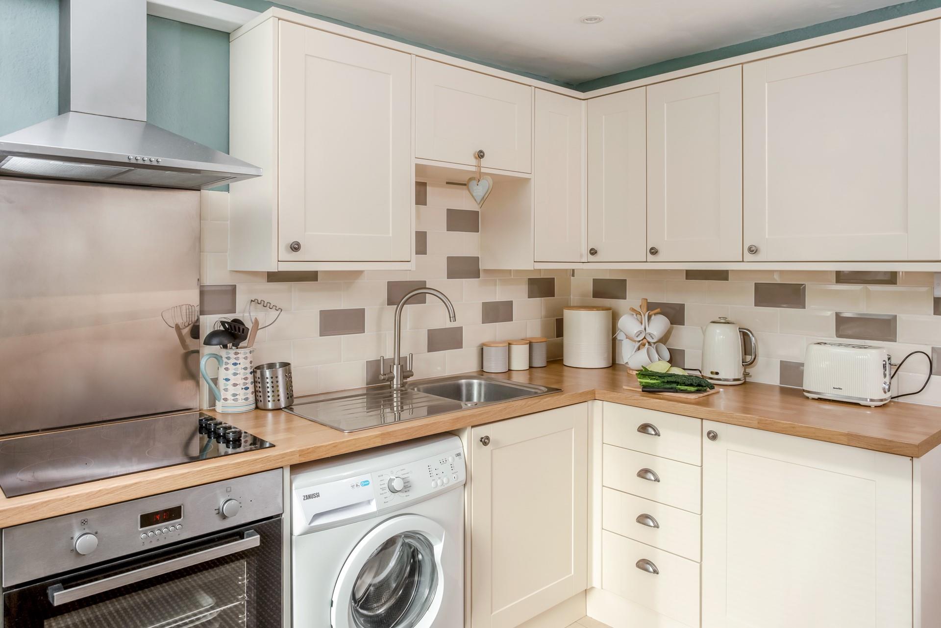 The kitchen has all the appliances needed to cook a tasty meal.